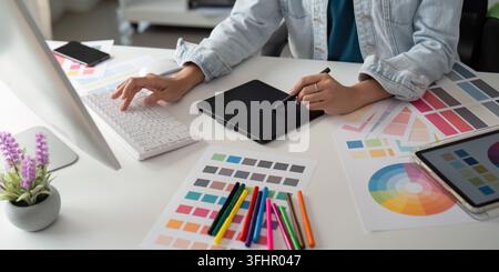 Asian woman graphic designer working in home office. Artist creative designer illustrator graphic skill concept Stock Photo