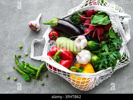 Fresh vegetables and fruits in eco  string bag Stock Photo