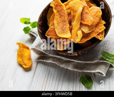Dried Mango Fruit on Old Wooden Background Stock Photo