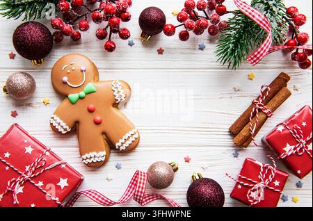 Christmas gingerbread with christmas decorations on white wooden table Stock Photo