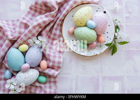 Colorful Easter eggs on plate Stock Photo