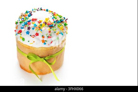 Traditional easter cake decorated with colorful sprinkles and tied with green ribbon Stock Photo