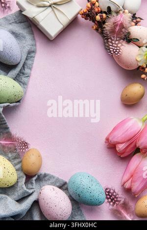 Pink tulips and Easter eggs background Stock Photo