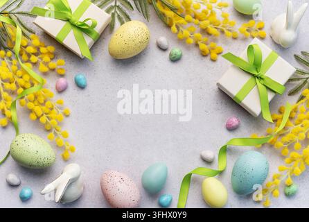 Festive Easter Celebration With Decorated Eggs and Gifts on a Light Background Stock Photo
