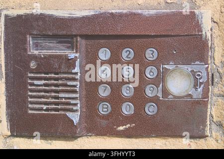 Old intercom in the entrance close-up. Stock Photo