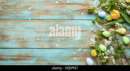 Easter background with   colored eggs and decorations on green background . Top view. Flat lay Stock Photo