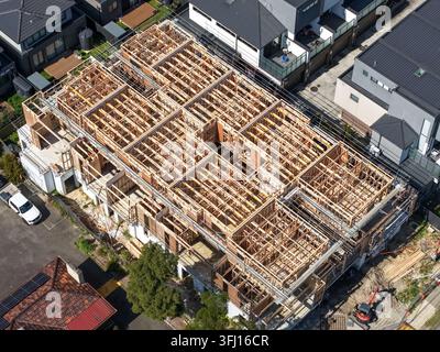 Melbourne, Australia - 18 September 2026: Aerial view of the Knox construction site showing the wooden framing of a multi-level residential building u Stock Photo