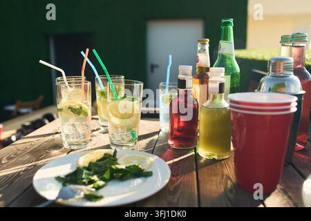 Refreshing Summer Drinks and Cocktails on Wooden Table Stock Photo