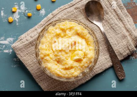 Corn porridge with butter. Healthy baby food Stock Photo