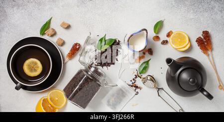 Tea composition on light grey background. Flat lay. Top view. Banner Stock Photo