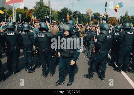 Angola Riot Police Riot police officers in protective gear surround a group of ...