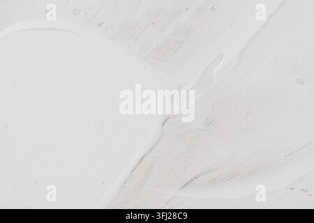White acrylic paint stroke background featuring thick textured brushwork on artist canvas created for modern abstract fine art or creative minimalist Stock Photo