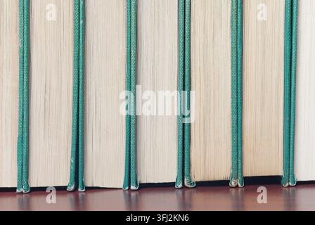 old encyclopedia books on shelf Stock Photo