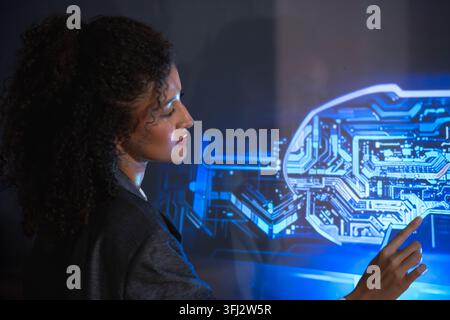 Business professional interacting with a digital human interface, representing artificial intelligence, machine learning, human technology collaborati Stock Photo