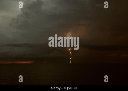 Pula, Croatia. 18th Sep, 2026. A lightning strike illuminates the sky over the sea on September 18, 2026 in Pula, Croatia, as a new wave of severe weather hits Croatia in the afternoon and evening. Photo: Sasa Miljevic/PIXSELL Credit: Pixsell/Ģ����ý Live News Stock Photo