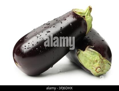 Two ripe eggplants with water drops isolated on white Stock Photo