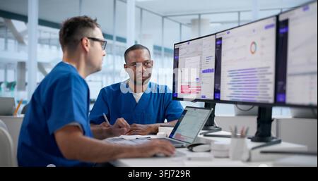 Clinical Trial Manager Reviews Patient Enrollment Data On Laptop Screen. Stock Photo