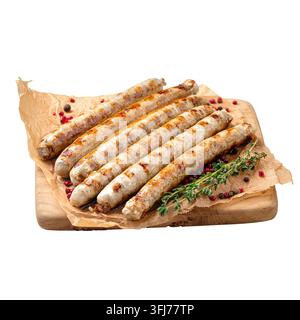 Fried chicken sausages on wooden board Stock Photo