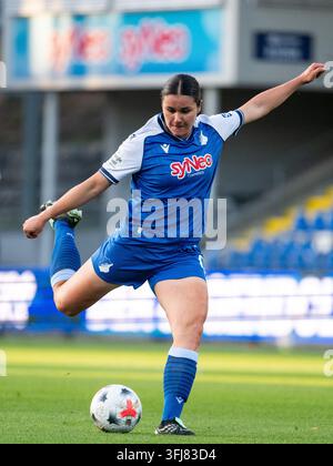 Svenja Fölmli (Hoffenheim, #19) on the ball in front of Medina Desic ...