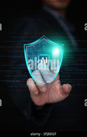 Finger touching glowing AI shield hologram over digital code background, representing artificial intelligence cybersecurity, data protection, network Stock Photo