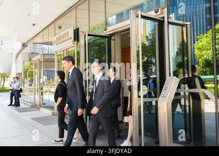 Mourner leaves the Kai Tak Community Hall after signing the condolence book and paying respects to former Chief Executive Tung Chee-hwa on September 19, 2026 in Hong Kong. (Photo by Zulu Lo/TMHK via Nexpher Images) Stock Photo