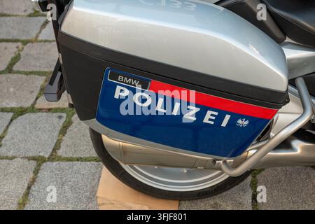 VIENNA, AUSTRIA, 12 September 2026: Close-up of a BMW police motorcycle pannier displaying German Polizei markings. Stock Photo