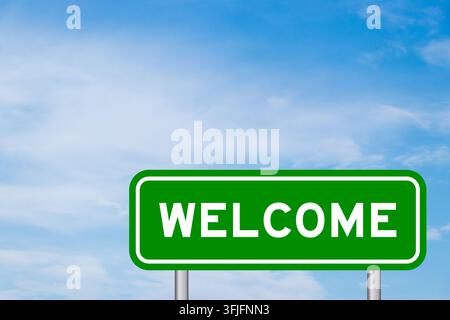 Green color transportation sign with word welcome on blue sky with white cloud background Stock Photo