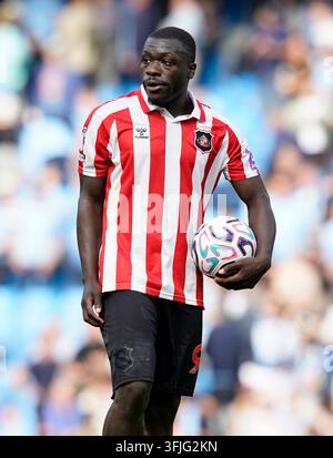 brian-brobbey-of-sunderland-with-his-hat-trick-match-ball-after-the