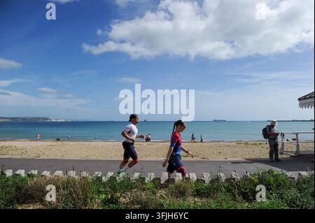 Weymouth, Dorset, UK. 20th Sep, 2026. Race Winner Harry Lamb (552) runs ...
