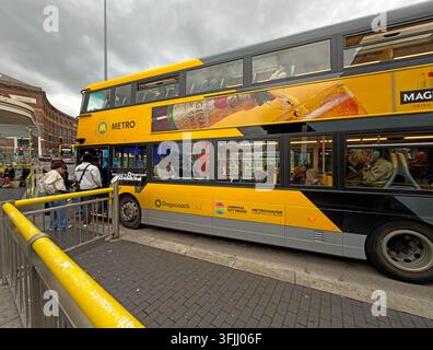 Stagecoach double-decker in yellow Liverpool City Region Metro branded livery during the rollout of bus franchising in Liverpool. Stock Photo