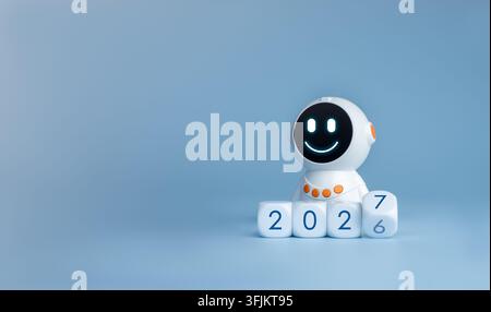 Friendly futuristic robot assistant beside new year 2027 number blocks on blue background. Artificial intelligence, automation trends, technology outl Stock Photo