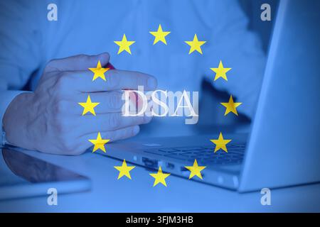 Close-up of a person using a tablet device with fingers interacting with the touchscreen, featuring a European Union flag overlay with the text “DSA”. Stock Photo