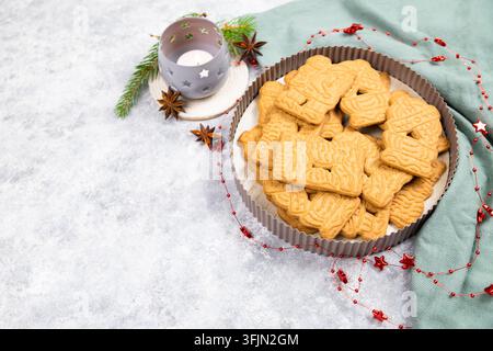 Spekulatius cookies or biscuits, spiced gingerbread with cinnamon, clove and cardamom, traditional christmas holiday pastry, homemade baking Stock Photo