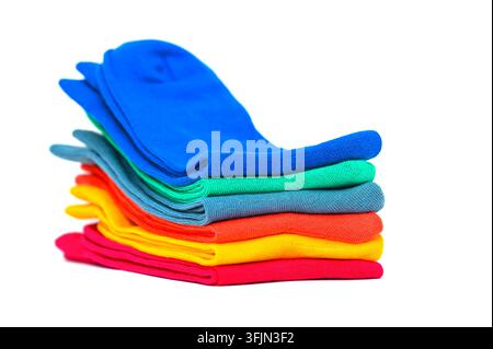Stack of colours unisex socks isolated on white background, space for text Stock Photo
