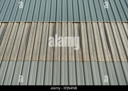 Corrugated metal sheet wall texture with vertical parallel lines pattern Stock Photo