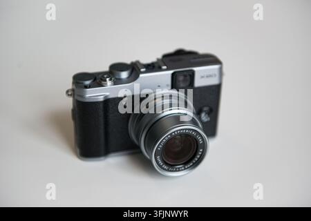 Gothenburg, Sweden - February 11 2013: Fujifilm X30 digital camera on a white table. Stock Photo
