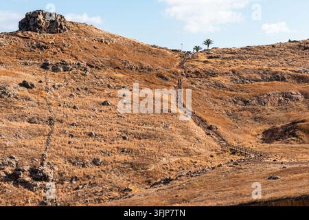 Winding Hiking Trail Through Rocky Coastal Hills Above the Atlantic Ocean Stock Photo