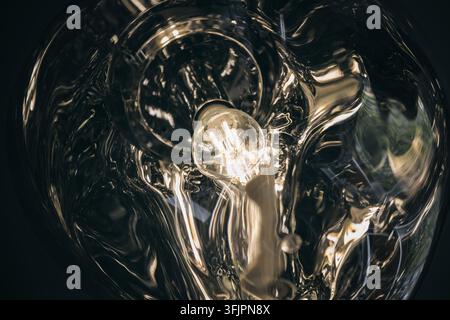 Distorted pendant light, creating abstract effect Stock Photo