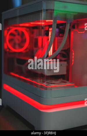 Modern computer system unit with red backlight Stock Photo