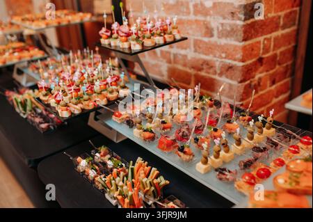 Elegant catering buffet with assorted gourmet appetizers and canapes Stock Photo