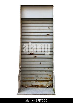 old weathered metallic roller shutter with rust stains and damaged paint, isolated on white  with clipping path Stock Photo