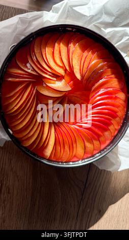 Peach plum tart cake preparing for baking Stock Photo
