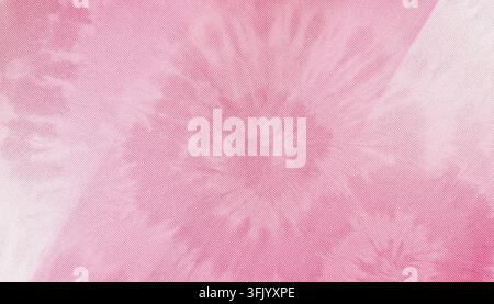 A close-up view of a soft pink tie-dye fabric, featuring subtle circular patterns and a woven textile texture throughout the material. Stock Photo