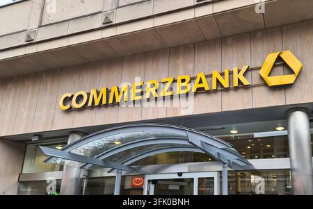 The Commerzbank name and yellow logo are displayed above the entrance ...