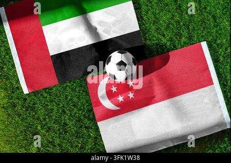 United Arab Emirates and Singapore flags waving on isolated white ...