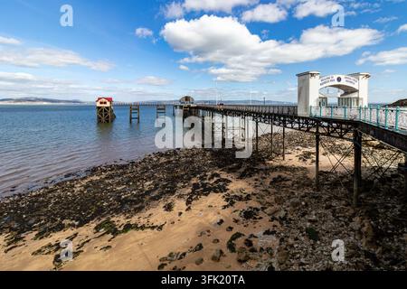 Mumbles Pier Victorian structure extending into Swansea Bay at low tide in Mumbles, Swansea, Wales Stock Photo
