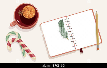Flat lay Christmas notepad with pencil and mulled wine mug on wooden ...