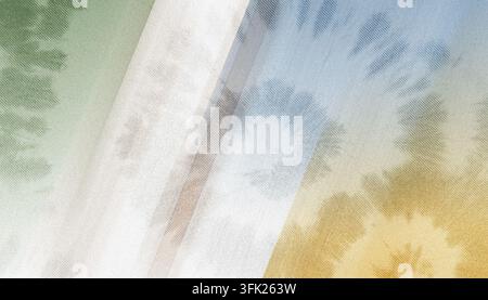 A detailed view of a multi-colored tie-dye textile with distinct diagonal sections of green, white, blue, and gold. Stock Photo