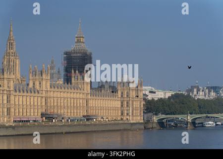 Restoration scaffolding surrounds London's Elizabeth Tower at the Palace of Westminster, the iconic home of the UK Parliament. Stock Photo
