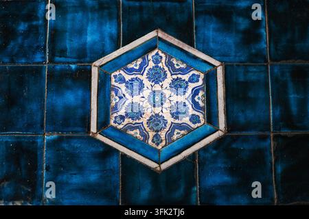 Blue floral ceramic tile pattern with geometric design Stock Photo
